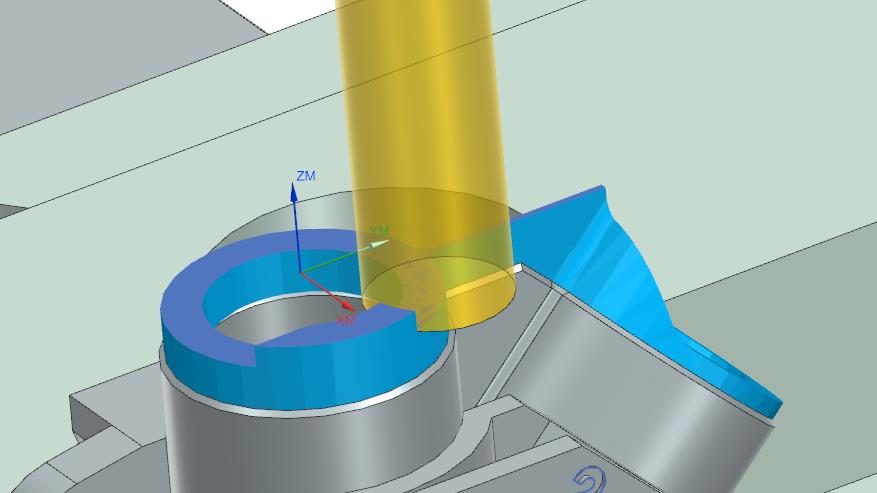 Siemens NX simulation of floor facing: a yellow tool above the boss, removed material shown in blue